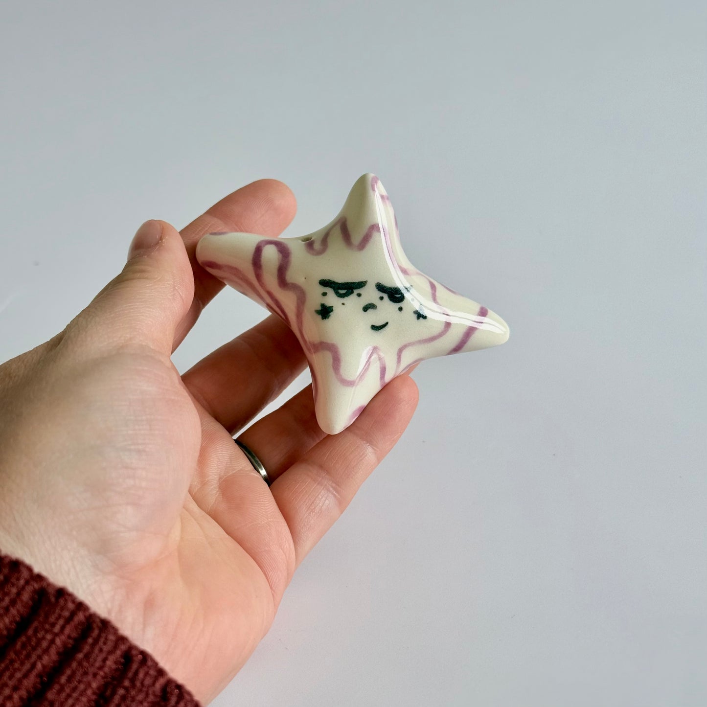 Ceramic sleepy star face